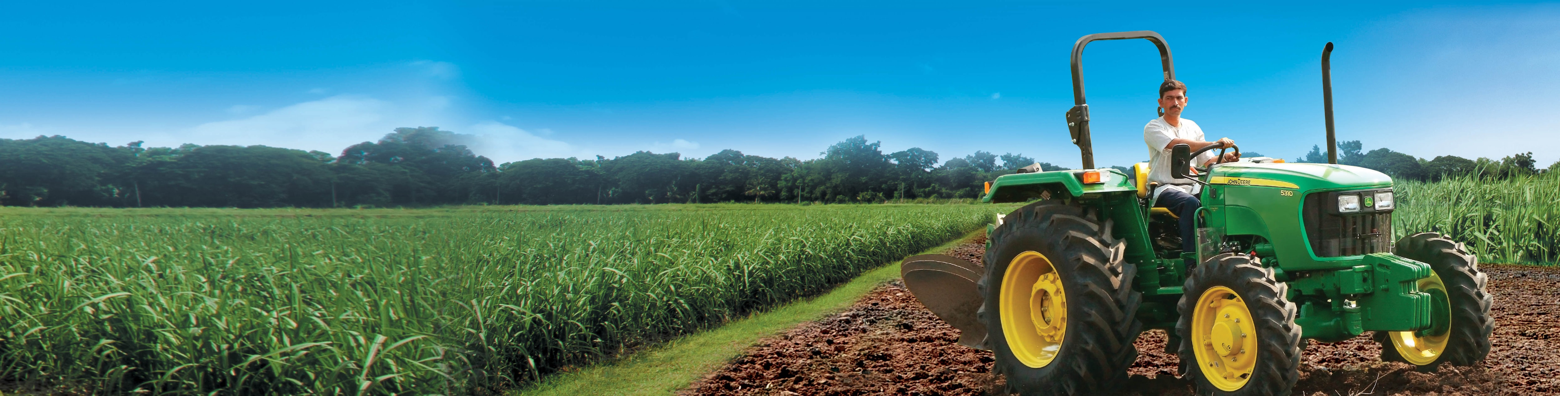 ಹೊಲ ಮತ್ತು John Deere ಟ್ರ್ಯಾಕ್ಟರ್